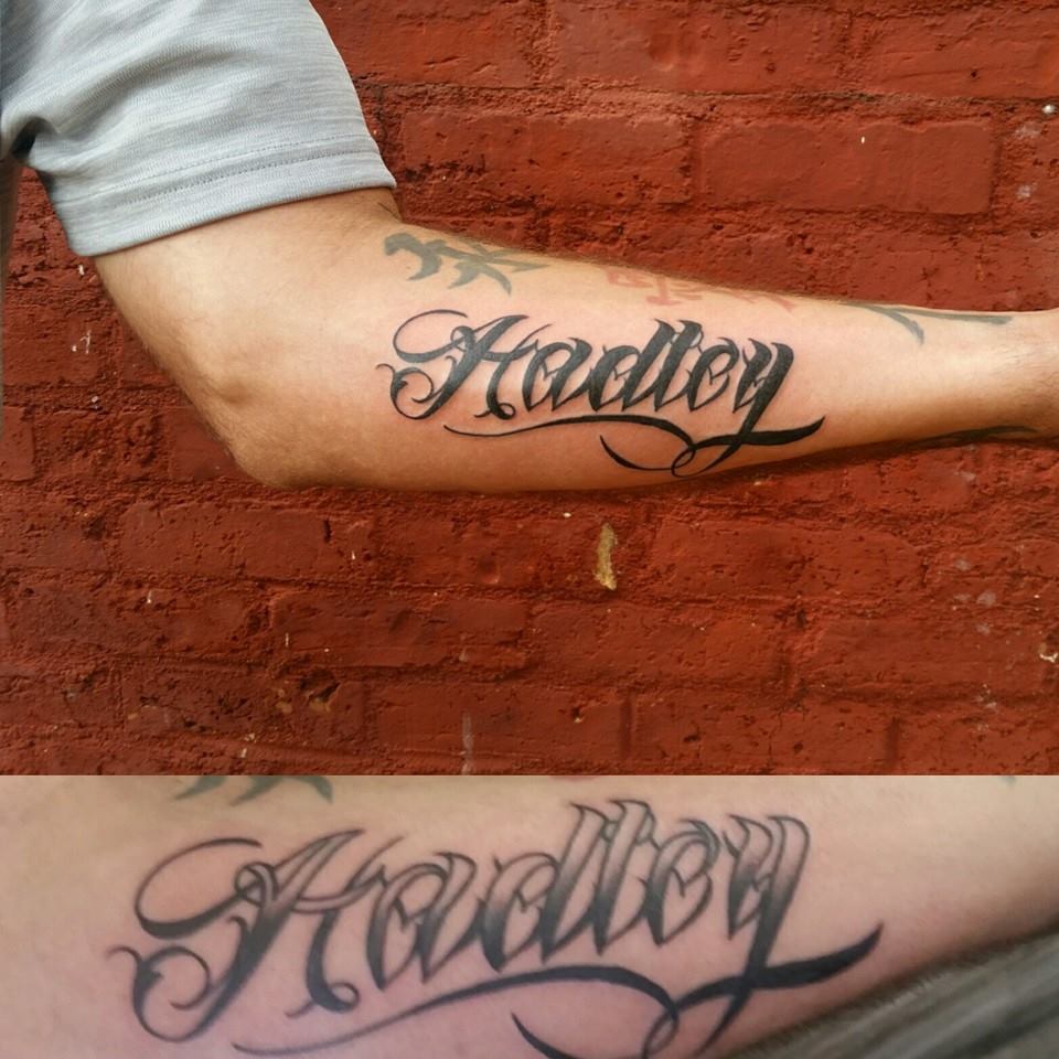 A script name fixup by Chico Lou's Fine Tattoos in Athens, GA