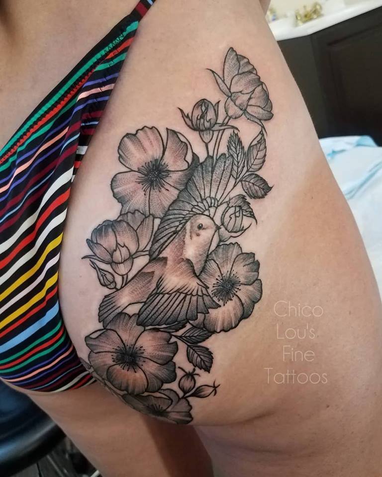 Blackwork bird and flowers by Chico Lou's Fine Tattoos shop in Athens Georgia GA. Artist - Sara Fogle