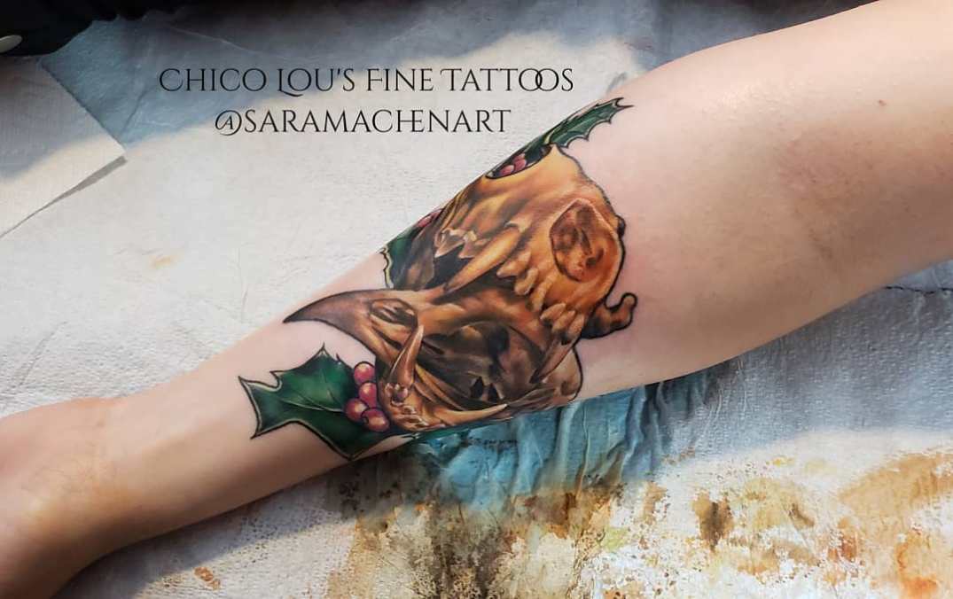 Holly and skulls by Chico Lou's Fine tattoos shop in Athens Georgia GA. Artist - Sara Fogle
