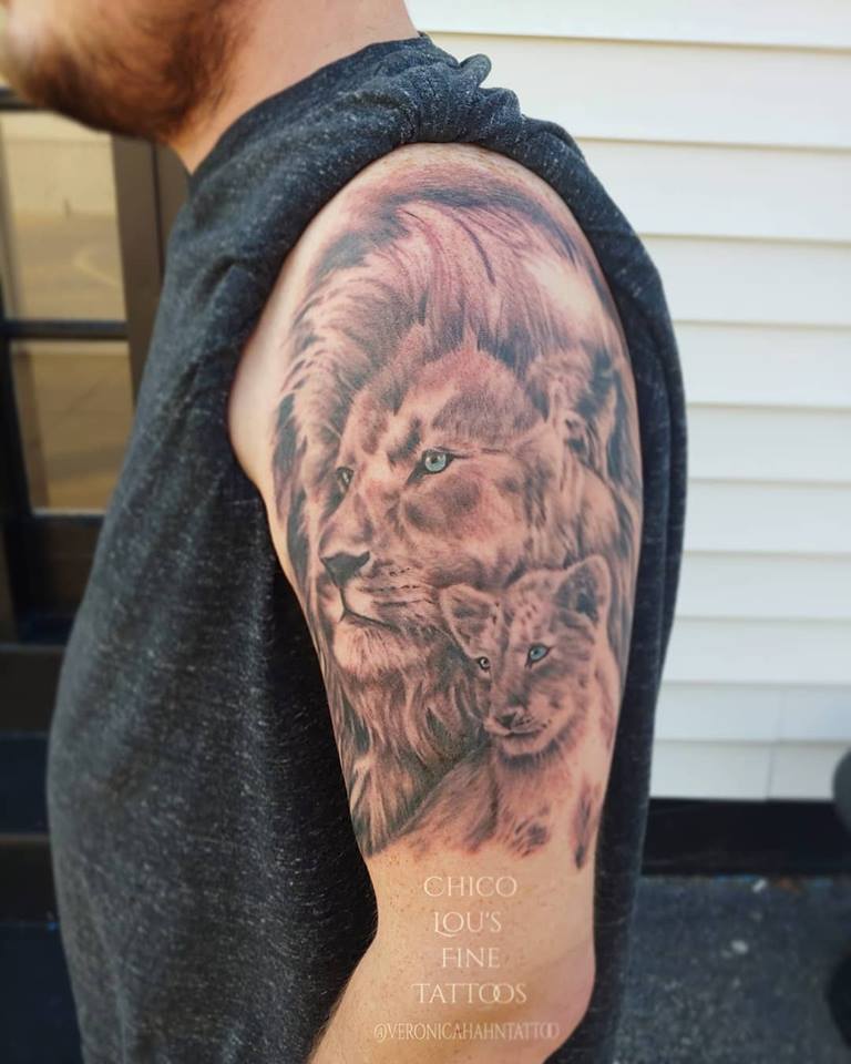Lion and cub by Chico lou's Fine Tattoos shop in Athens georgia GA. Artist - Veronica Hahn